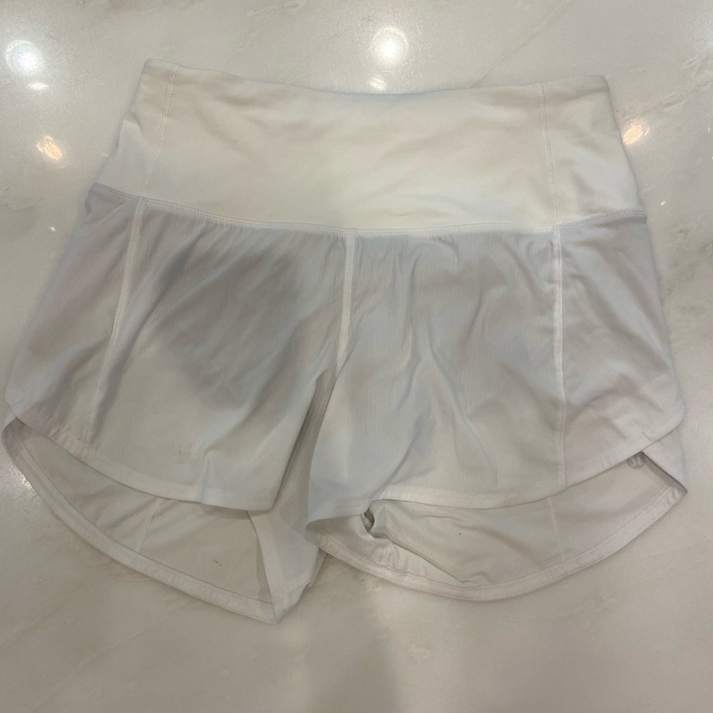 Lulu lemon shorts. Size 4, 4 inch. White